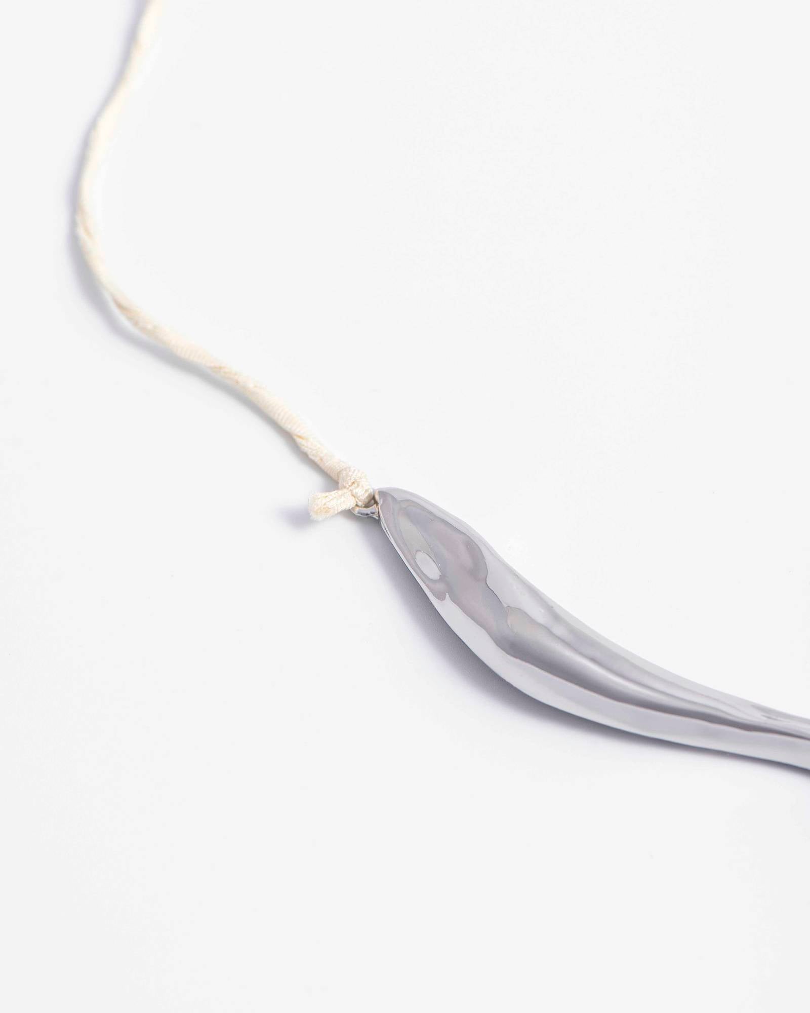 COLLANA CON ELEMENTO IRREGOLARE