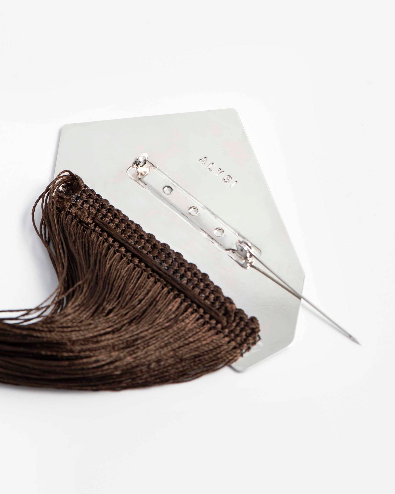 SPILLA PLACCA CON FRANGE