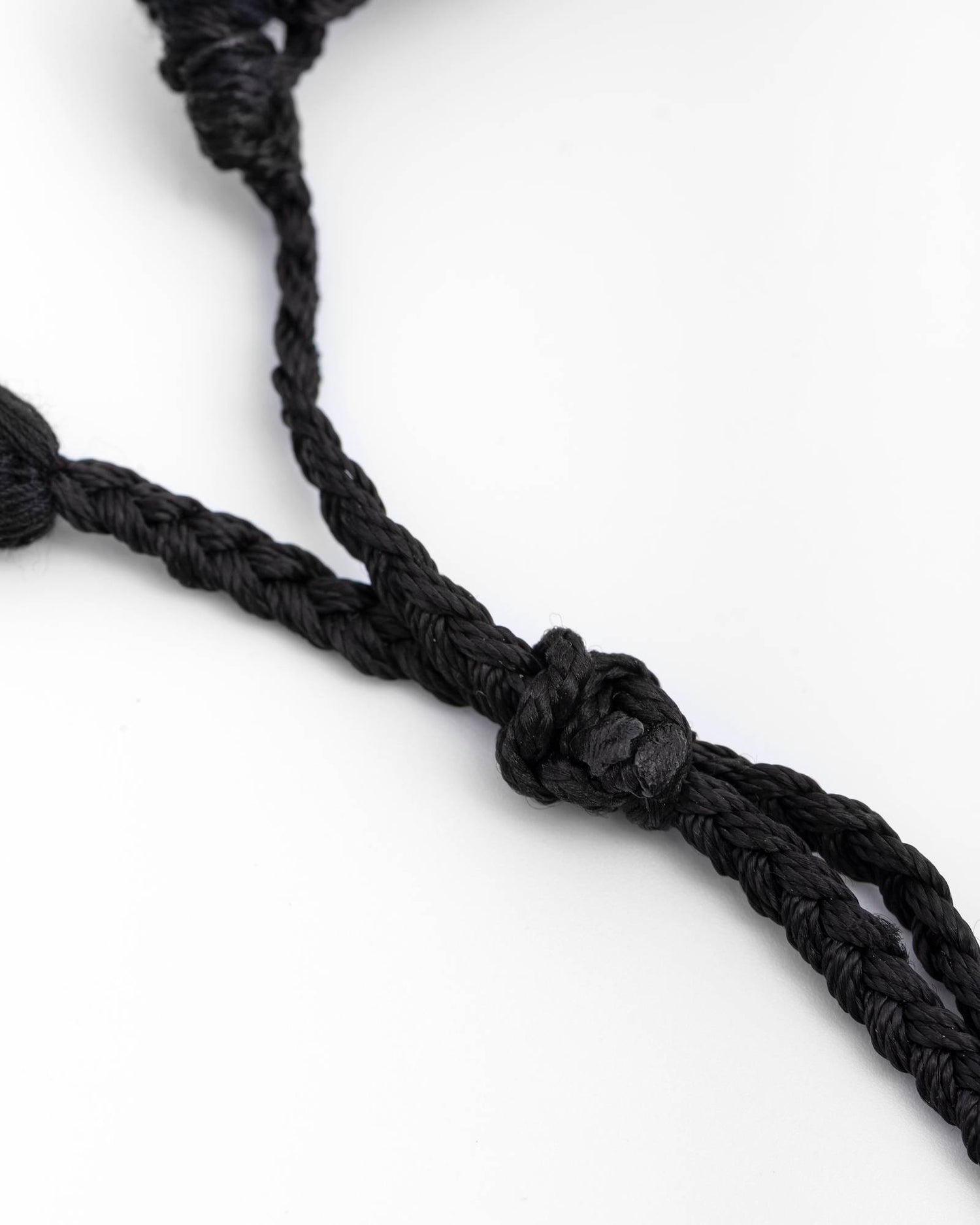 BRACCIALE INTRECCIATO CON PERLINE