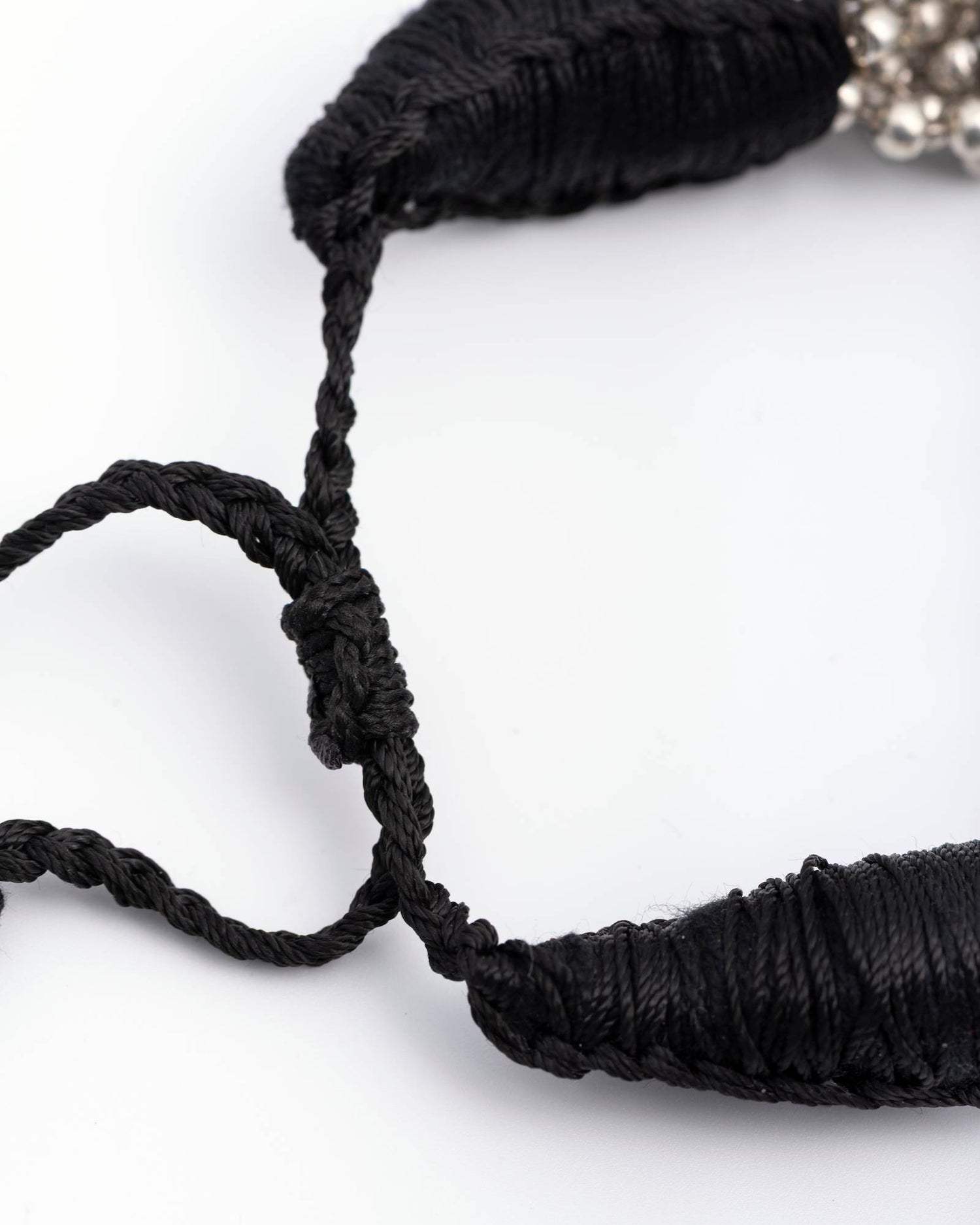 BRACCIALE INTRECCIATO CON PERLINE