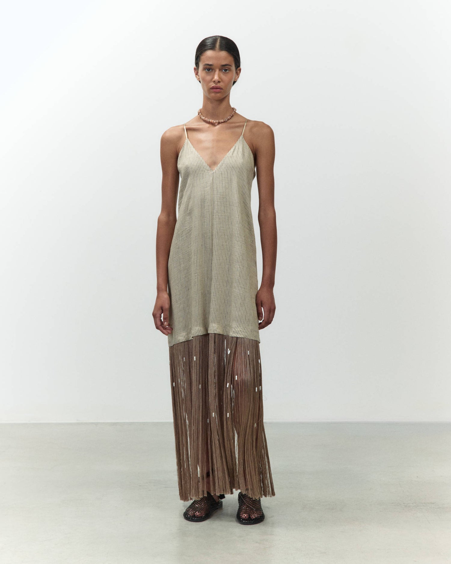 ABITO LUNGO CON FRANGE